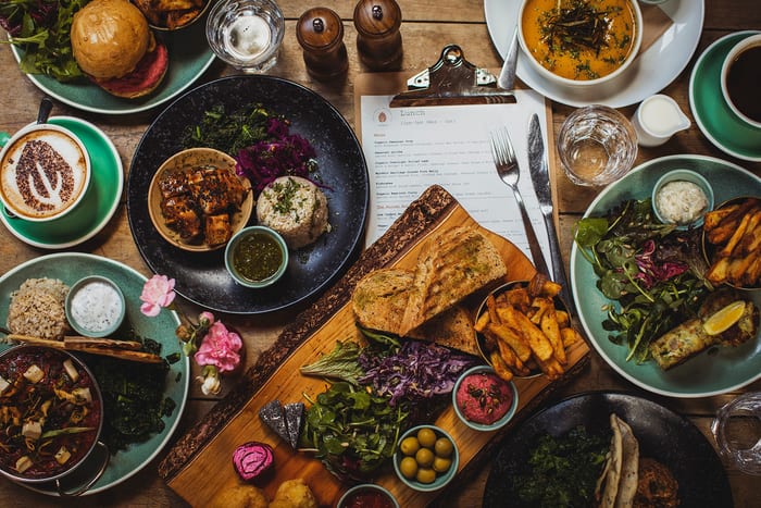 A spread of Sunday lunch dishes on the table at The Warren