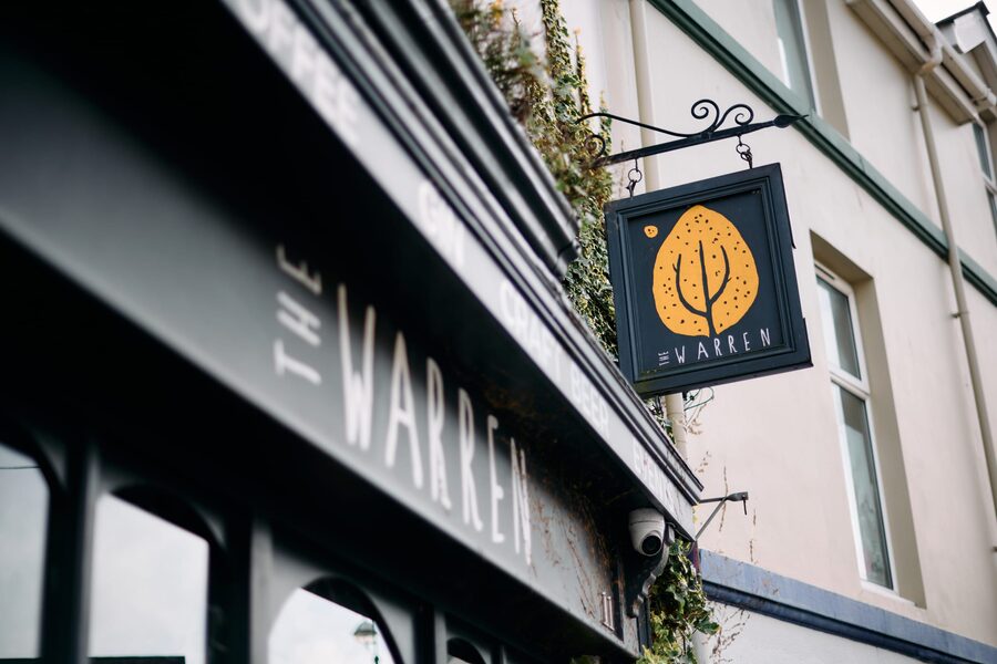 The Warren's hanging sign on Mansel Street